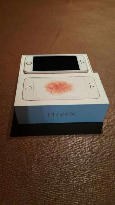 Iphone SE 16 gig rose gold with box and accessories